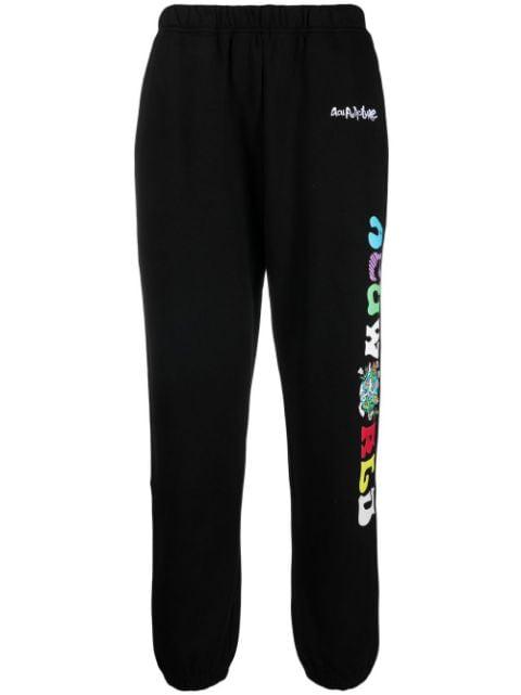 embroidered-slogan sweatpants by ACUPUNCTURE