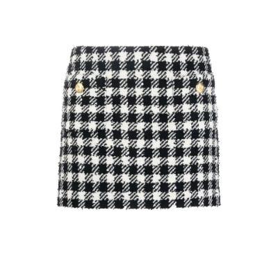 Black and white houndstooth bouclé skirt by ALESSANDRA RICH