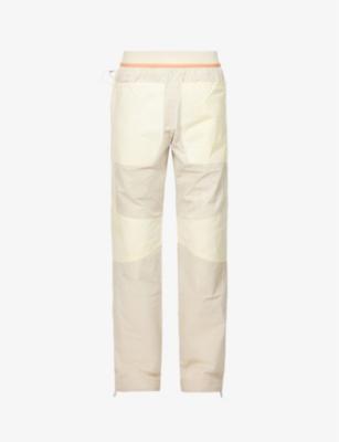 Pistill panelled tapered-fit cotton-poplin trousers by ARNAR MAR JONSSON