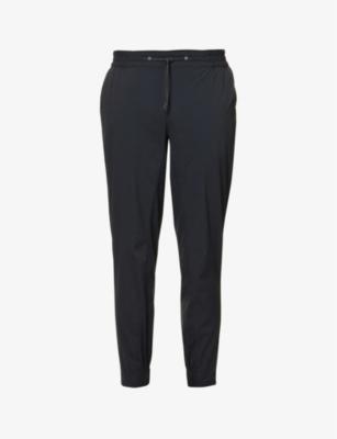 Urban Theran tapered-leg mid-rise woven trousers by BERGHAUS