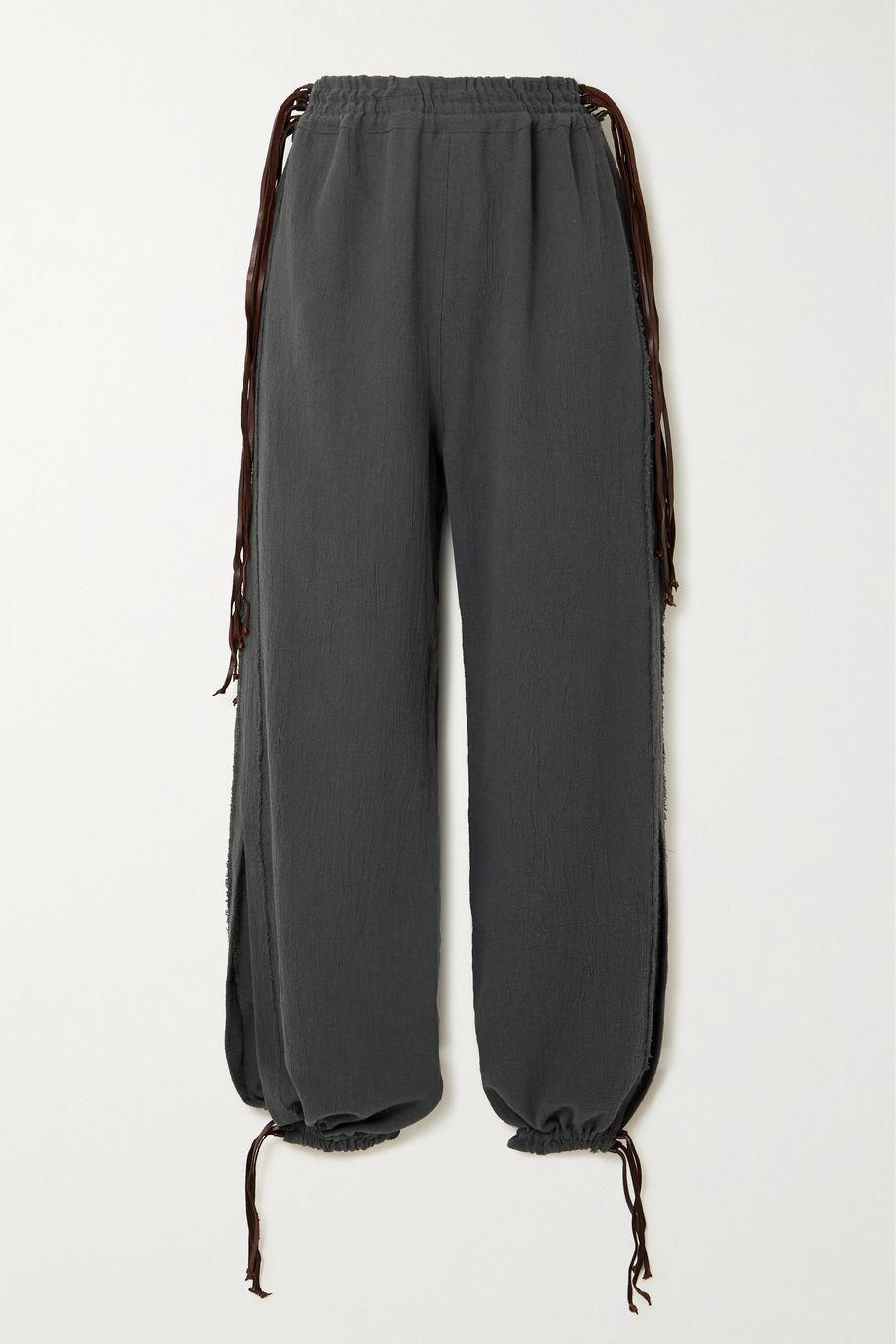 + NET SUSTAIN Tesmukuy leather-trimmed cotton-gauze track pants by CARAVANA