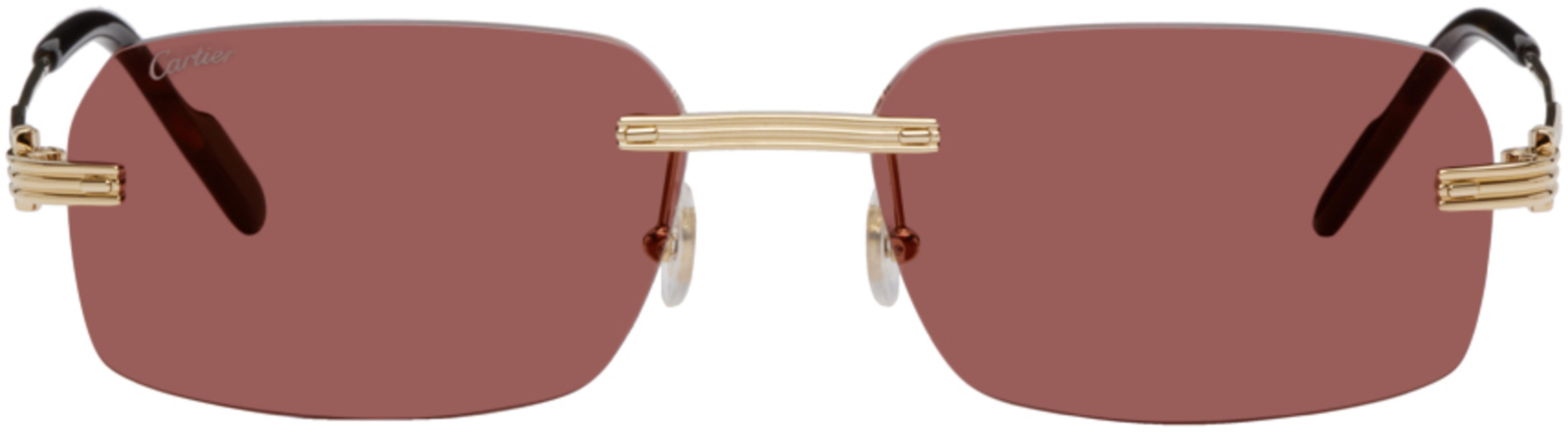 Gold Rimless Sunglasses by CARTIER