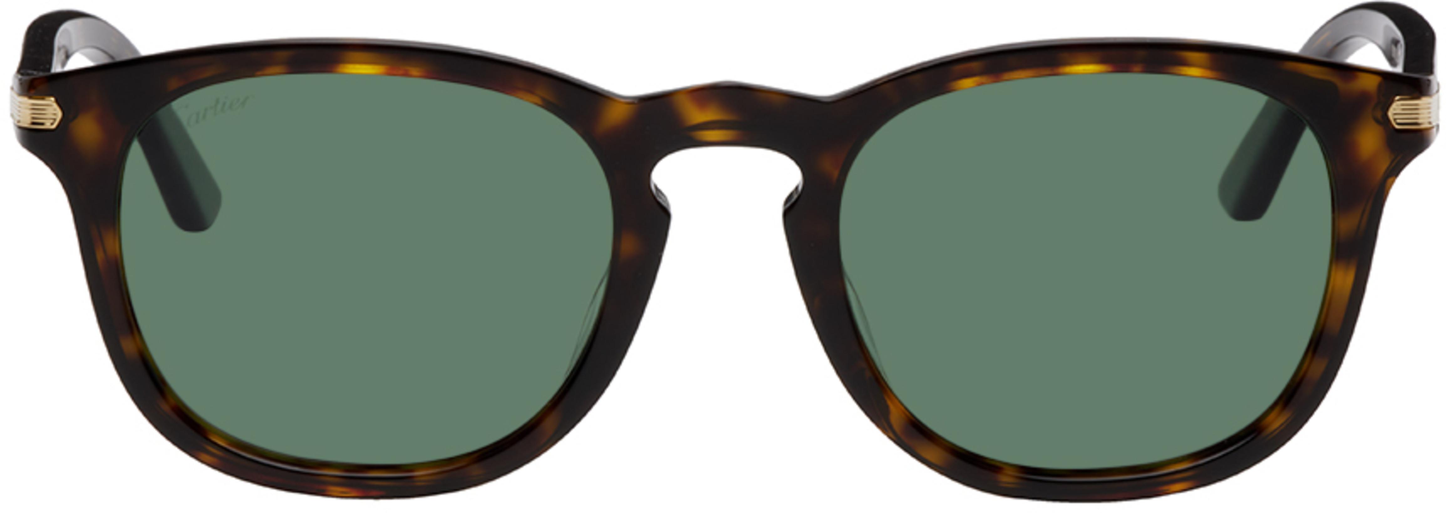 Tortoiseshell Oval Sunglasses by CARTIER