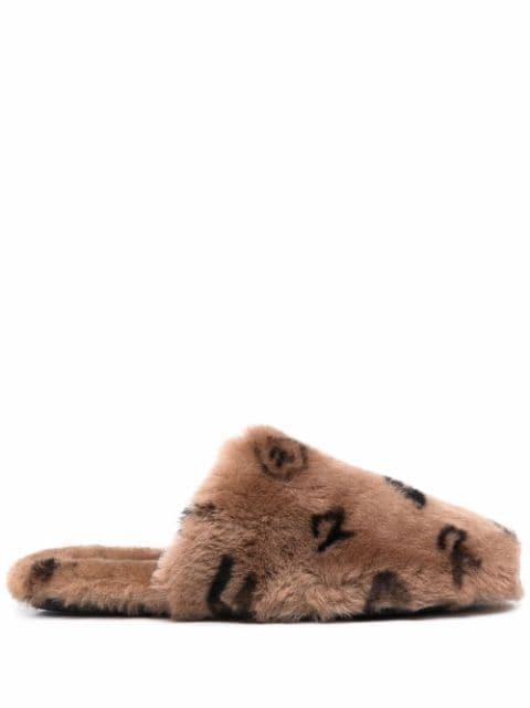 slip-on shearling slippers by COMMON LEISURE