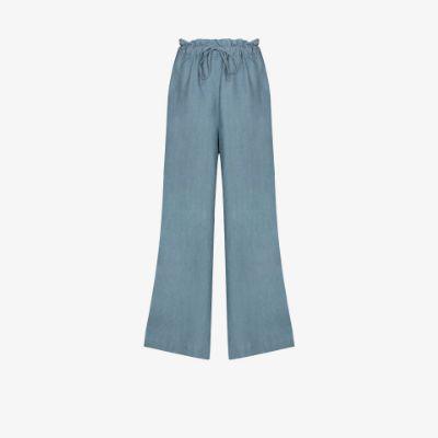blue Château wide leg linen trousers by DES SEN