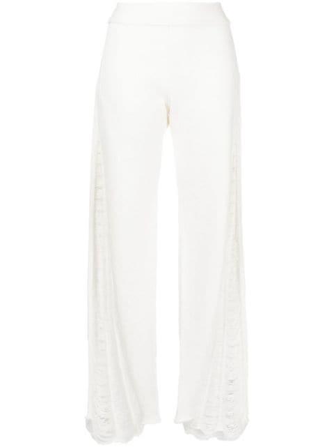 Distressed Float knitted trousers by DION LEE