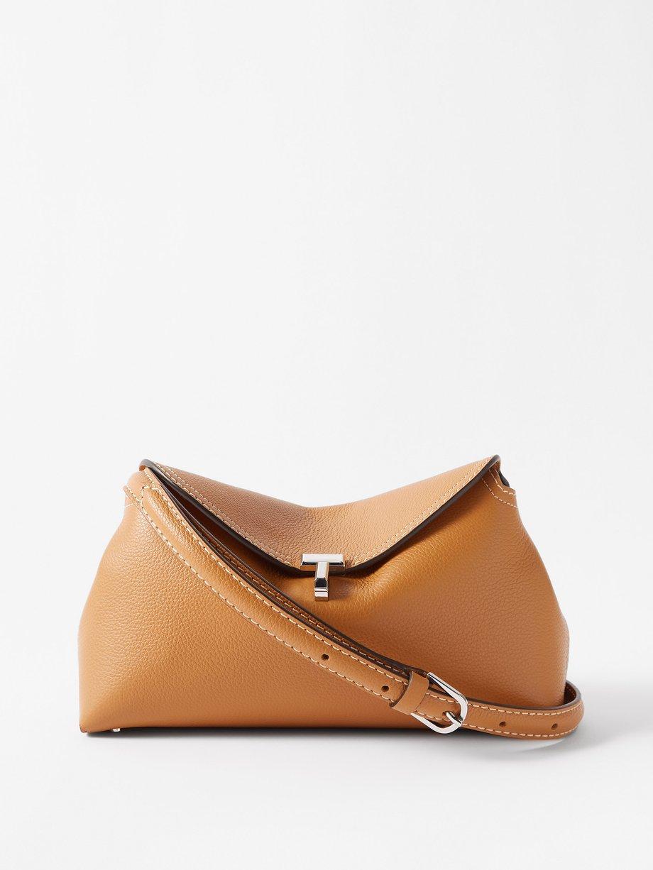 TLock small grainedleather crossbody bag by TOTEME jellibeans